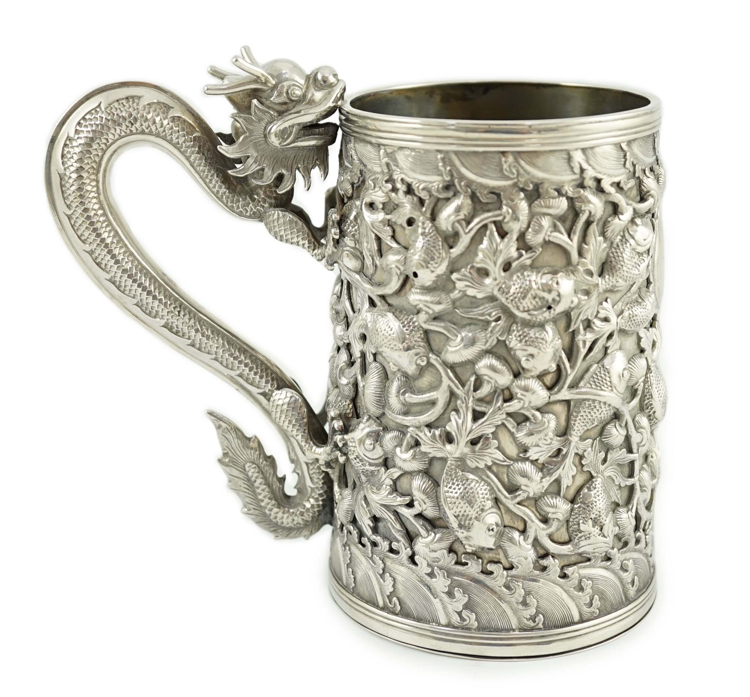 A late 19th century Chinese Export double skinned silver mug, by Cumwo
